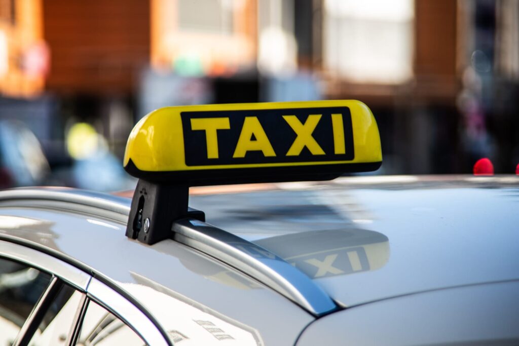 Taxi Sign On Wagon Roof